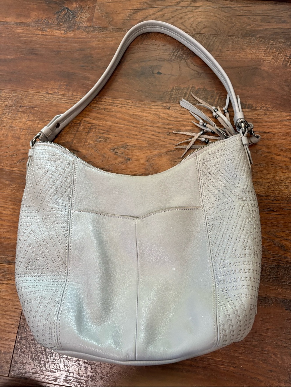 The Sak Light Gray Leather Hobo Shoulder Bag with Tassel Detail